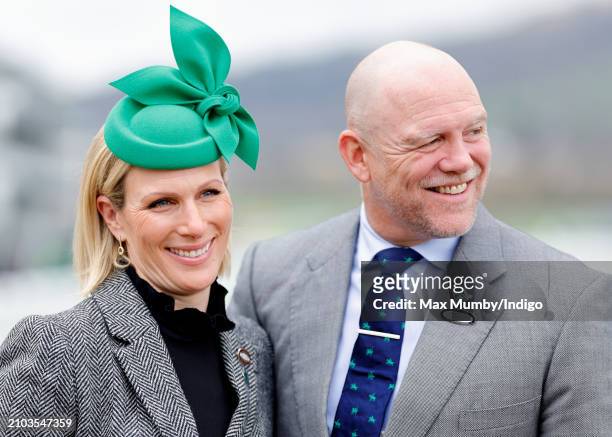 Zara Tindall and Mike Tindall attend day 3 'St Patrick's Thursday' of the Cheltenham Festival at Cheltenham Racecourse on March 14, 2024 in...
