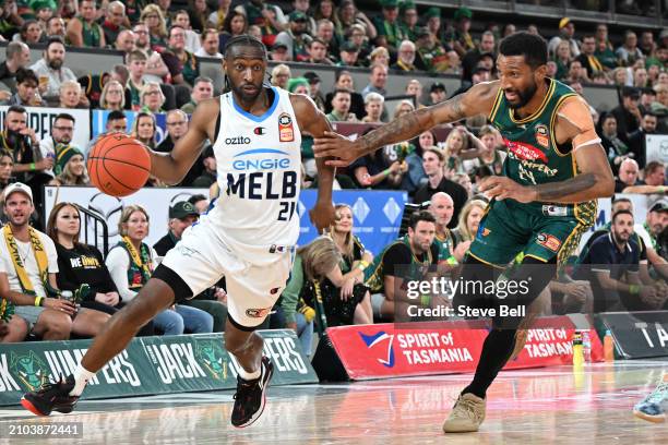 Marcus Lee of the Jackjumpers blocks Ian Clark of United during game two of the NBL Championship Grand Final Series between Tasmania Jackjumpers and...