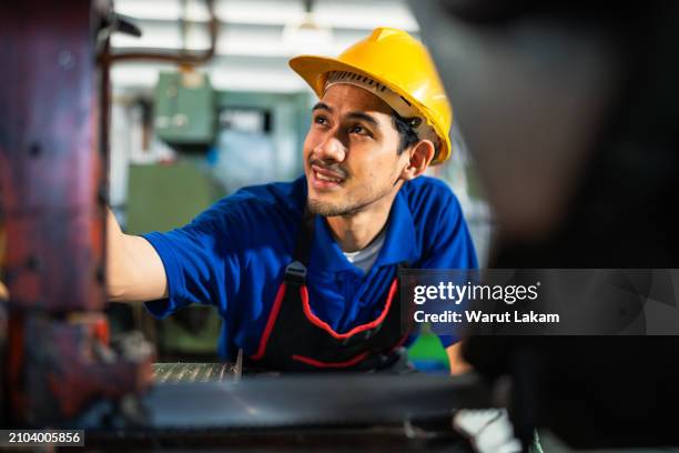 Stock Machine Operator 225 Heavy Machine Operator Stock Photos, High-Res Pictures, and Images ...
