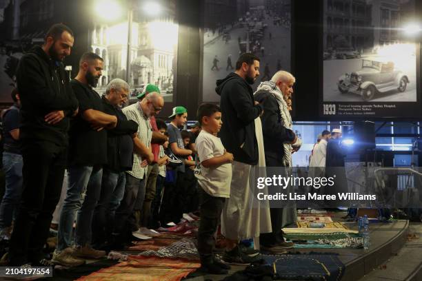 Members of the Sydney Muslim community hold Taraweeh Prayer for Palestine at Martin Place on March 22, 2024 in Sydney, Australia. Ramadan has taken...