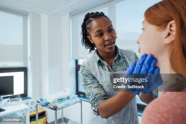 doctor examining patients condition - emotional series stock pictures, royalty-free photos & images