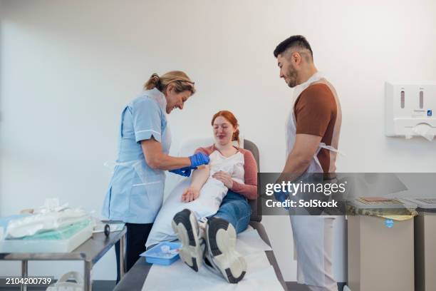 taking care at hospital - medical examination room stock pictures, royalty-free photos & images