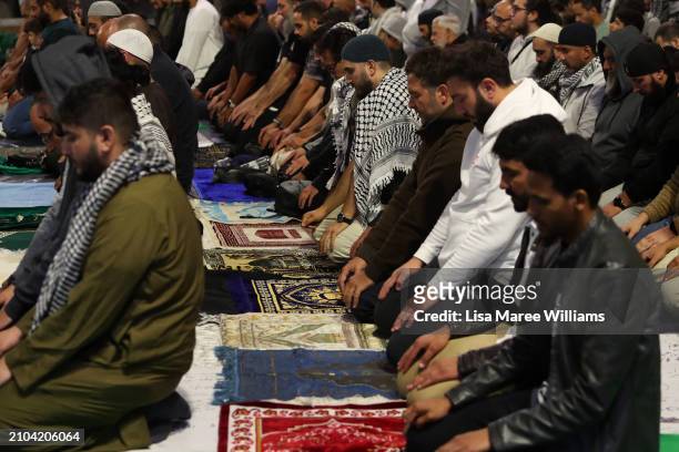 Members of the Sydney Muslim community hold Taraweeh Prayer for Palestine at Martin Place on March 22, 2024 in Sydney, Australia. Ramadan has taken...