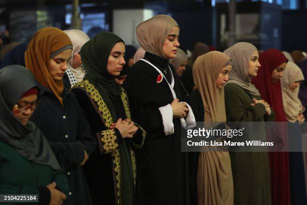 Members of the Sydney Muslim community hold Taraweeh Prayer for Palestine at Martin Place on March 22, 2024 in Sydney, Australia. Ramadan has taken...