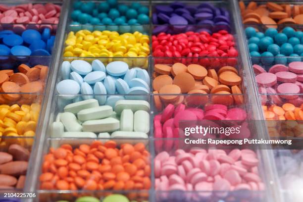 colorful of medicine tablets and capsules. - steroids stock pictures, royalty-free photos & images