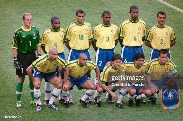 The Brazil team line up of back row left to right, Claudio Taffarel, César Sampaio, Rivaldo, Aldair, Junior Baiano and Cafu, Front Row, Ronaldo,...