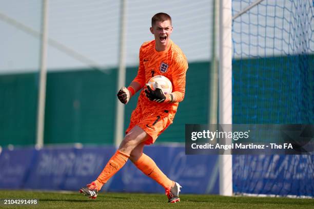 Finlay Herrick of England U18 celebrates after making a save in the penalty shoot out during the International Friendly match between England U18 and...