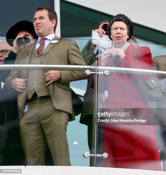 Peter Phillips and Princess Anne, Princess Royal watch the racing from the balcony of the Royal Box as they attend day 4 'Gold Cup Day' of the...