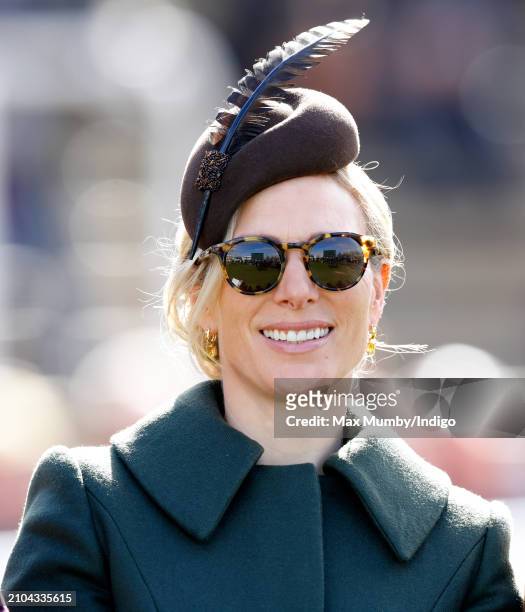 Zara Tindall watches the racing as she attends day 4 'Gold Cup Day' of the Cheltenham Festival at Cheltenham Racecourse on March 15, 2024 in...