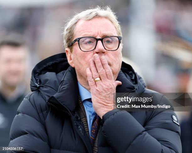 Harry Redknapp watches his horse 'The Jukebox Man' run in the Albert Bartlett Novices' Hurdle on day 4 'Gold Cup Day' of the Cheltenham Festival at...