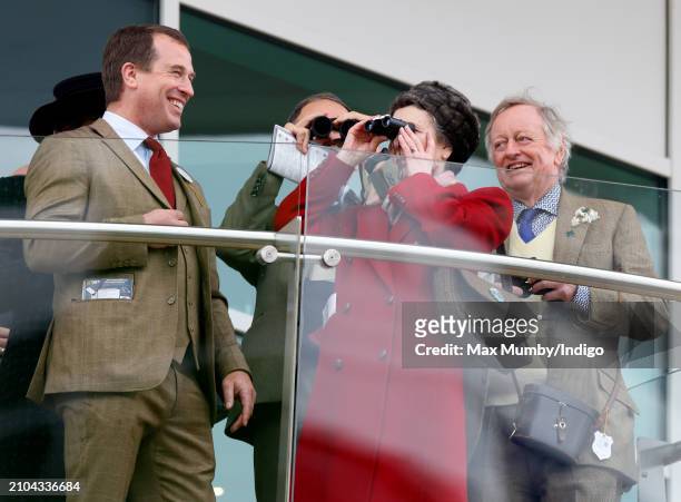 Peter Phillips, Princess Anne, Princess Royal and Andrew Parker Bowles watch the racing from the balcony of the Royal Box as they attend day 4 'Gold...