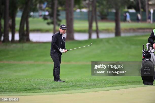 Brian Harman of the United States chips on the 17th green during the second round of the Valspar Championship at Copperhead Course at Innisbrook...