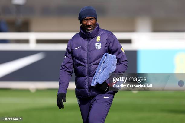 England coach Jimmy Floyd Hasselbaink looks on during a training session at St Georges Park on March 22, 2024 in Burton-upon-Trent, England.