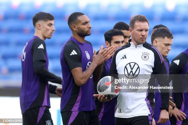 Julian Nagelsmann, head coach of Germany looks on during a training session of team Germany at Groupama Stadium on March 22, 2024 in Lyon, France.