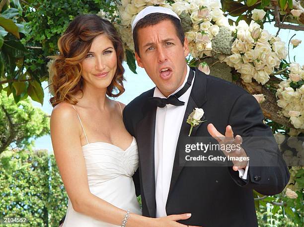 In this handout photo, Adam Sandler poses with his bride model-actress Jackie Titone at their wedding June 22, 2003 in Malibu, California.