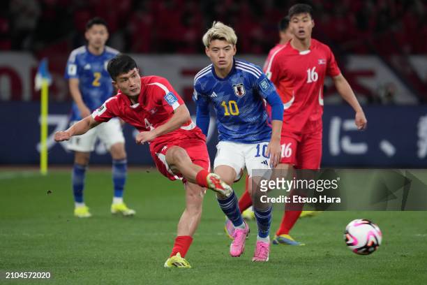 Pom Hyok Kim of North Korea in action during the FIFA World Cup Asian 2nd qualifier match between Japan and North Korea at National Stadium on March...