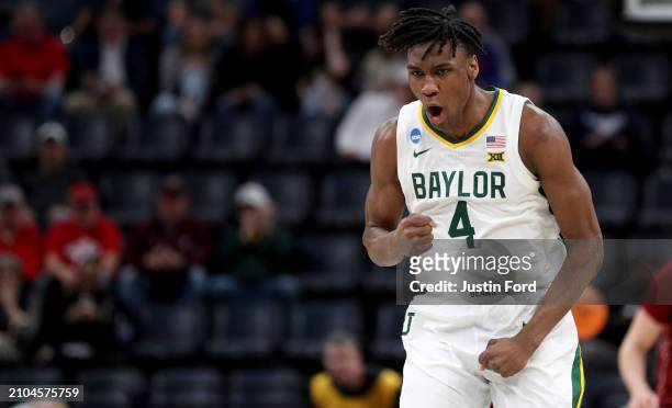 Ja'Kobe Walter of the Baylor Bears reacts to a play in the first round of the NCAA Men's Basketball Tournament against the Colgate Raiders at...