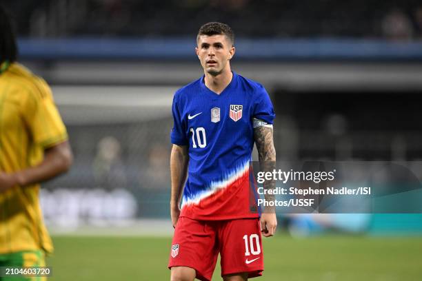 Christian Pulisic of the United States walks downfield during the Concacaf Nations League semifinals match between Jamaica and USMNT at AT&T Stadium...