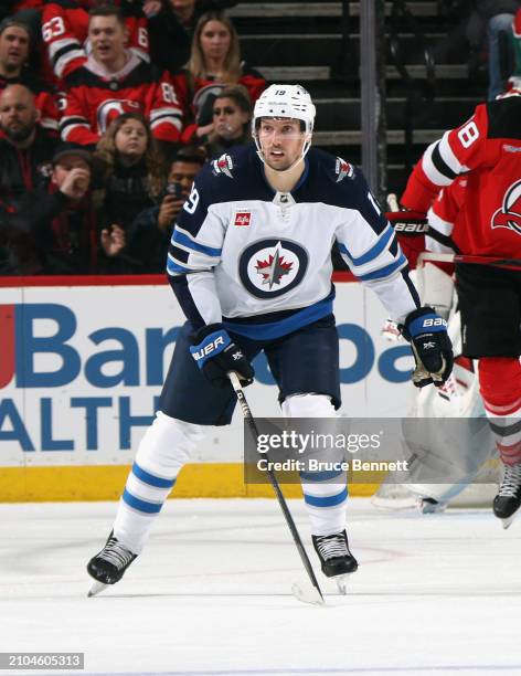 David Gustafsson of the Winnipeg Jets skates against the New Jersey Devils at Prudential Center on March 21, 2024 in Newark, New Jersey.