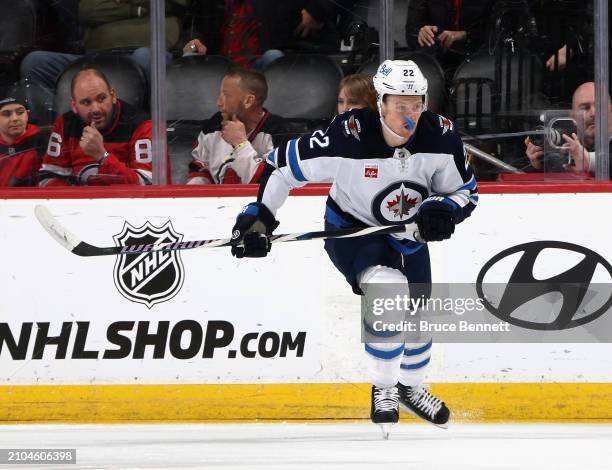 Mason Appleton of the Winnipeg Jets skates against the New Jersey Devils at Prudential Center on March 21, 2024 in Newark, New Jersey.