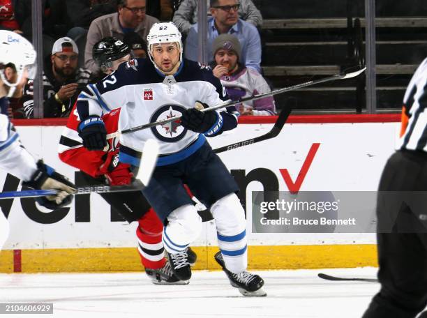 Nino Niederreiter of the Winnipeg Jets skates against the New Jersey Devils at Prudential Center on March 21, 2024 in Newark, New Jersey.