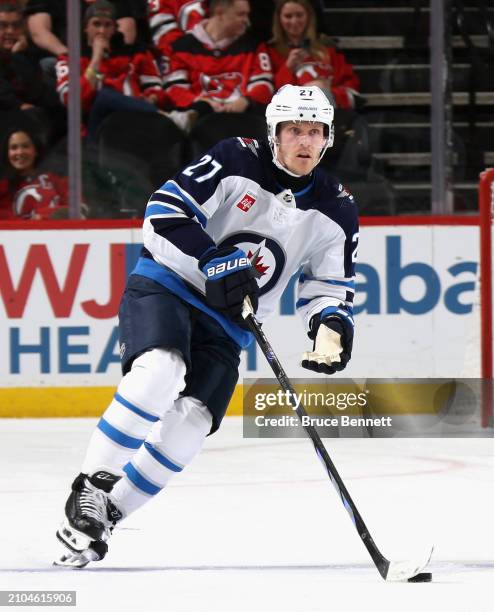 Nikolaj Ehlers of the Winnipeg Jets skates against the New Jersey Devils at Prudential Center on March 21, 2024 in Newark, New Jersey.