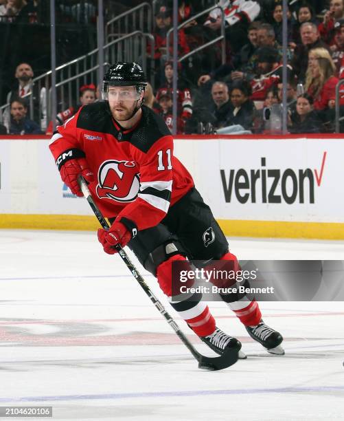 Chris Tierney of the New Jersey Devils skates against the Winnipeg Jets at Prudential Center on March 21, 2024 in Newark, New Jersey.