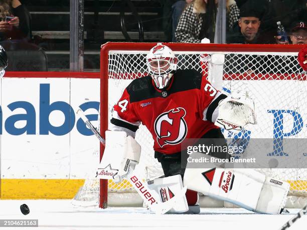 Jake Allen of the New Jersey Devils skates against the Winnipeg Jets at Prudential Center on March 21, 2024 in Newark, New Jersey.