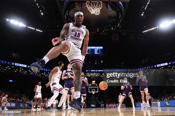 Alijah Martin of the Florida Atlantic Owls dunks in the first half against the Northwestern Wildcats in the first round of the NCAA Men's Basketball...