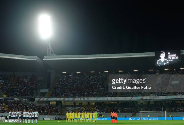 Players during a minute of silence in memory of former Portuguese Internacional Antonio Pacheco before the start of the International Friendly match...