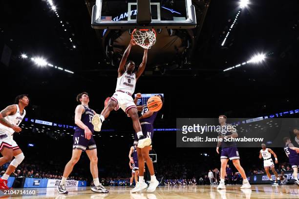 Brenen Lorient of the Florida Atlantic Owls dunks the ball during the second half of the game against the Northwestern Wildcats during the first...