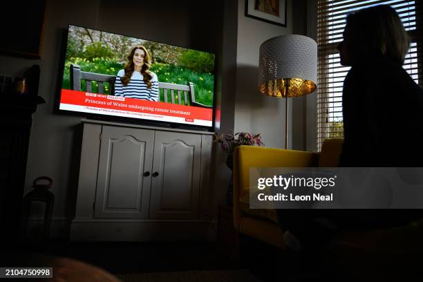 Relative of the Photographer watches television, as Catherine, The Princess of Wales announces that she is receiving a preventative course of...