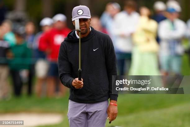 Tony Finau of the United States lines up a putt on the first green during the second round of the Valspar Championship at Copperhead Course at...