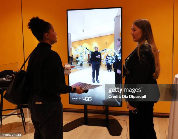 Attendees use the ZERO10 AR Mirror at The BoF Professional Summit at The Times Center on March 22, 2024 in New York City.