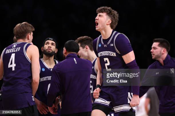 Nick Martinelli of the Northwestern Wildcats reacts during overtime against the Florida Atlantic Owls in the first round of the NCAA Men's Basketball...