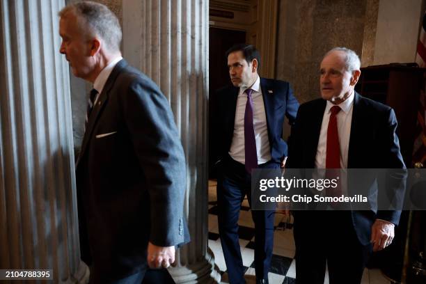 Sen. Dan Sullivan , Sen. Marco Rubio and Sen. James Risch leave a Republican Senate lunch meeting at the U.S. Capitol on March 22, 2024 in...