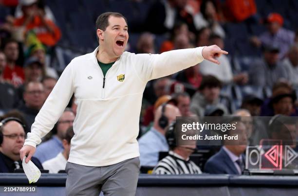 Head coach Scott Drew of the Baylor Bears reacts to a play in the first round of the NCAA Men's Basketball Tournament against the Colgate Raiders at...