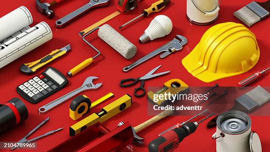 Assorted Construction Tools Spread Out on a Red Surface During Daytime Assorted Construction Tools Spread Out on a Red Surface During Daytime