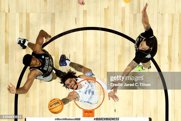 Davis of the North Carolina Tar Heels attempts a lay up against the Wagner Seahawks during the second half in the first round of the NCAA Men's...