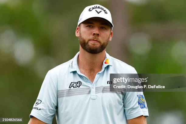 Sam Burns of the United States reacts to his shot from the sixth tee during the second round of the Valspar Championship at Copperhead Course at...