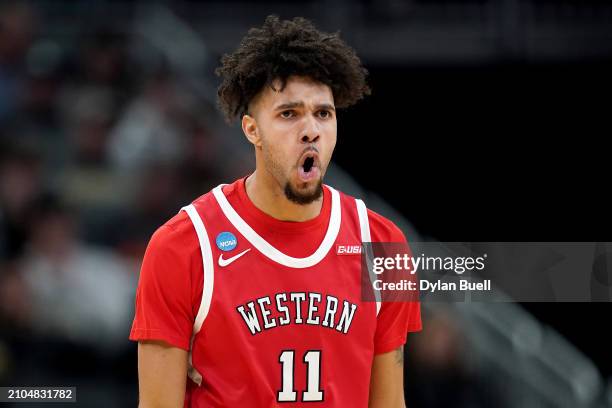 Dontaie Allen of the Western Kentucky Hilltoppers celebrates a three point basket against the Marquette Golden Eagles during the first half in the...