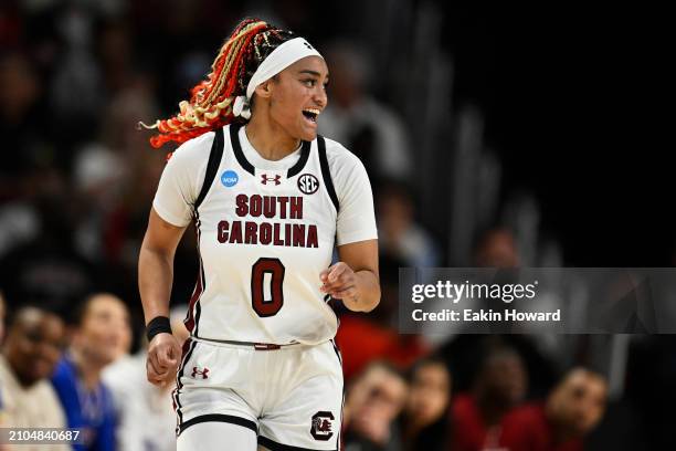 Te-Hina Paopao of the South Carolina Gamecocks celebrates her three-point basket against the Presbyterian Blue Hose in the second quarter during the...