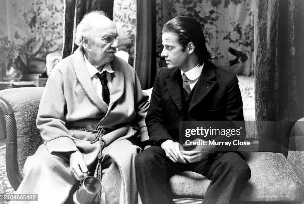 Actors Ralph Richardson and Christopher Lambert , 'Greystoke: The Legend of Tarzan, Lord of the Apes', London, UK, 1983. {Photo by Murray Close/Getty...