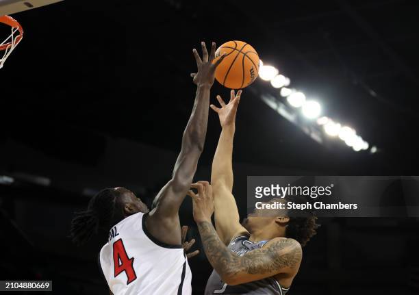 Yaxel Lendeborg of the UAB Blazers drives to the basket against Jay Pal of the San Diego State Aztecs during the second half in the first round of...