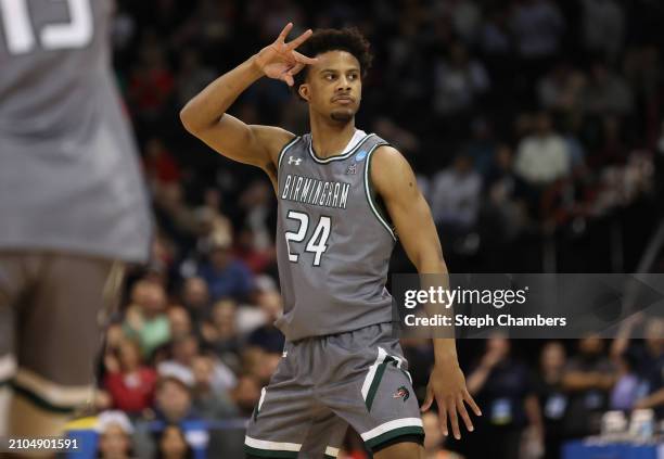 Efrem Johnson of the UAB Blazers reacts after a three point basket during the second half against the San Diego State Aztecs in the first round of...