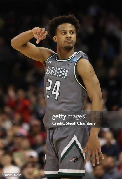 Efrem Johnson of the UAB Blazers reacts after a three point basket during the second half against the San Diego State Aztecs in the first round of...