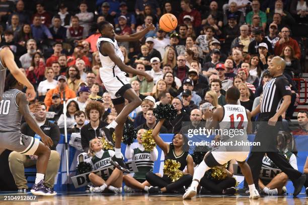 Jay Pal of the San Diego State Aztecs saves a ball out of bounds during the second half against the UAB Blazers in the first round of the NCAA Men's...