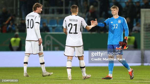 Nick Woltemade, Nicolo Tresoldi and Jonas Urbig of Germany look on after the UEFA Under 21 EURO Qualifier match between Germany U21 and Kosovo U21 at...