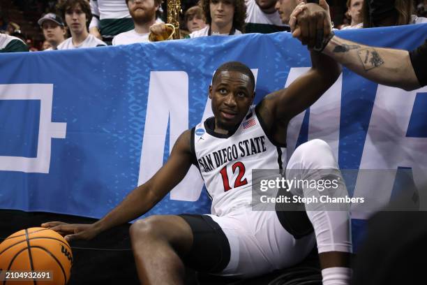 Darrion Trammell of the San Diego State Aztecs reacts after diving for a ball out of bounds during the second half against the UAB Blazers in the...