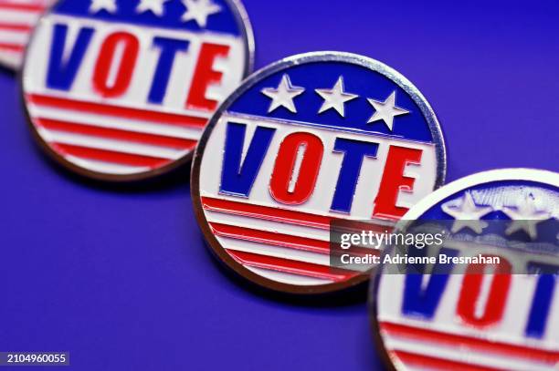 “vote” pins in a row - circle badge stock pictures, royalty-free photos & images